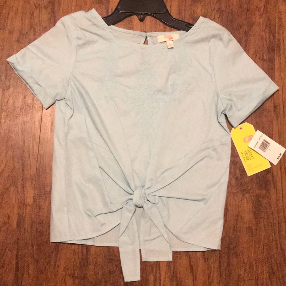 GB girls blue top